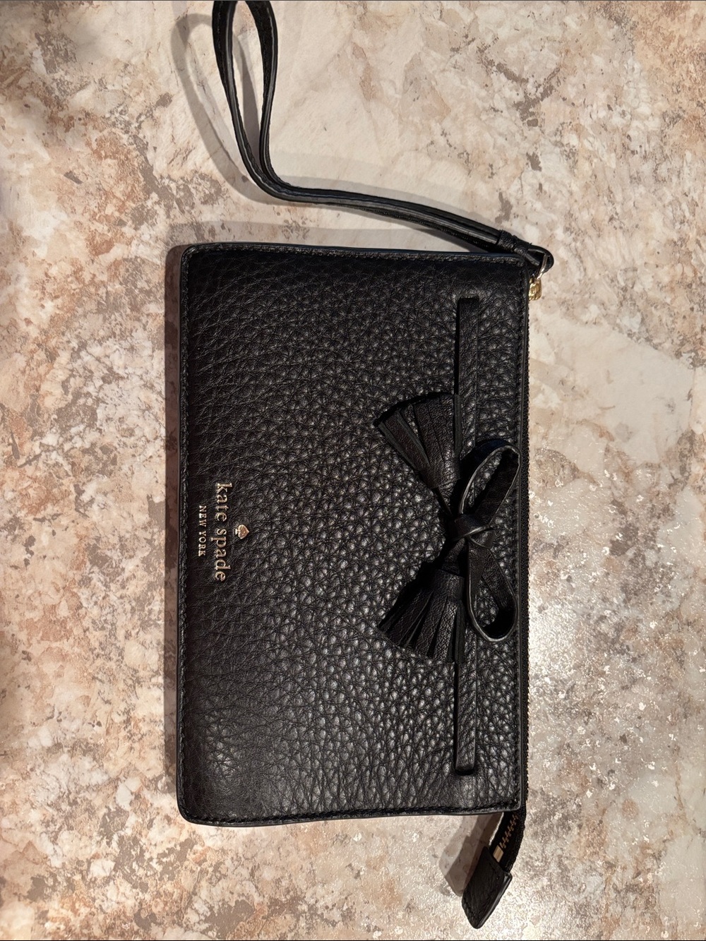 kate spade black pebbled leather wristlet with bow and tassel